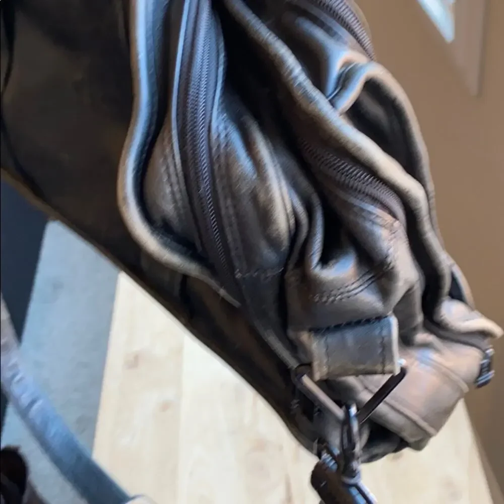 TUMI distressed leather messenger computer bag broken in rugged manly minimalist